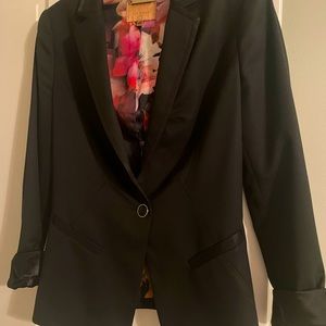 Beautiful Ted Baker black blazer w/ stunning floral lining.English size 2 (med)